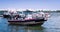 Toronto, Ontario, Canada - 2019 06 30: Toronto Police Marine Unit officer steering the police speedboat. The Toronto