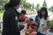 Toronto, Ontario / Canada - July 01, 2013: Children wait in line to get the Canada flag sticker