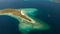 Torpical island with white sandy beach, top view.