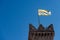 Torre Civica - Medieval civic tower with the flag of Trento Italy