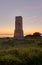 Torre de los ladrones Tower of the Thieves on sunset in Dunas de Artola natural monument, Cabopino, Andalusia