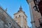 Torre del Alcazar de Toledo view from the Zocodover square with blue sky in the background. Toledo, Spain