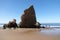 Torre del Loro Mazagon remains at Playa de Rompeculos beach in Mazagon, Spain