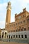 Torre del Mangia and town hall. The building and the Piazza del Campo di Siena are built with Tuscan terracotta bricks