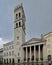 Torre del Popolo and Church of Santa Maria Sopra Minerva in the Communal Square of Assisi in Italy.