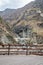 The torrential flow through the hills in Tibet, Rock bridge