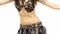 Torso of a beautiful female belly dancer, shaking her hips, on white