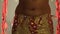 Torso of beautiful traditional oriental belly dancer shaking body slow motion