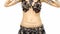 Torso of a exotic female belly dancer who is starting shaking her hips, on white