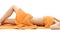 Torso of relaxed lady with orange towels