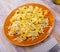 Tortellini with minced meat served with grated cheese