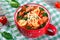 Tortellini soup with italian sausages, spinach, tomato, parmesan cheese