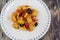 Tortelloni pasta with peppers, olives and cherry tomatoes