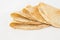 Tortilla, cakes made of wheat flour on white background