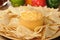 Tortilla chips with spicy cheese dip