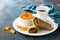 Tortilla coconut moringa wraps sandwiches with fresh vegetables, meat and homemade pumpkin chips