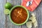 Tortilla Soup with Chips, fresh lime and spoon