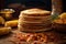 tortilla stack with corn kernels scattered nearby