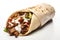 Tortilla wrap with meat, salad and mayonnaise