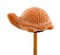 Tortoise in clay on wooden stick