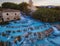 Toscane Italy, natural spa with waterfalls and hot springs at Saturnia thermal baths, Grosseto, Tuscany, Italy aerial