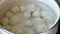 Toss frozen semis dumplings in boiling water in a saucepan