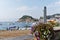 Tossa de Mar, Catalonia, Spain, August 2018. Beautiful sea view of the beach and the bay, the old castle on the cliff.