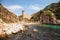 Tossa de mar, view of the castle tower and city walls. Fortress on the beach side. Blue lagoon and steep cliffs.