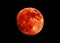 Total lunar eclipse. Super Blood Full Moon. Black night sky without stars. View in telescope telephoto lens. Astro or astronomy ph
