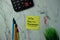 Total Quality Management write on sticky notes isolated on office desk