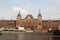 Total view on a imposing historical building at the riverside in amsterdam netherlands
