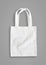 Tote bag mock up canvas fabric cloth shopping sack on grey background isolated with clipping path