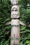 Totem pole in forest