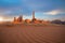 Totem pole and sand dunes  in Monument Valley, Arizona USA