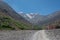 Toubkal national park in springtime with mount, cover by snow an