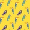 Toucans, exotic tropical birds watercolor seamless pattern on yellow background