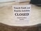 Touch tank closed sign with glass and sand