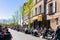 TOULOUSE, FRANCE - 26, MARCH, 2017 : Unknown group of people are having their lunch in a cafe in the city center on March 26, 2017