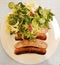 Toulouse sausages with salad, French food, French Gastronomy