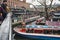 Tour boat passing Camden Market on Regent`s Canal, London, UK