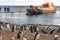 Tour boat with the tourists embarked to Magdalena Island. Penguins isle. The Penguins Natural Monument, Magellan Strait