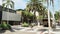 A tour bus drives up Rodeo Drive