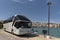 Tour bus on the seafront in Sitia an eastern Crete resort.