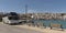 Tour bus on the seafront in Sitia an eastern Crete resort.