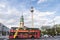 Tour bus with St Mary church and telecommunications tower in Ber