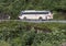 Tour Bus and tourists along Hai Van Pass, Vietnam.