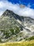 Tour de Mont Blanc hike with view along Dora di Ferret near Tete de Ferret