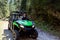 A tour group travels on ATVs and UTVs on the mountains