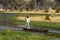 A tour guide on a mokoro canoe in Botswana