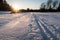 Tour ski trails in the sunset